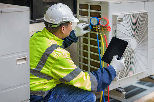 Professional Hvac technician working in Crum Lynne, PA